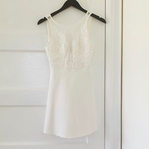 Lulus white dress. open V back, lace front